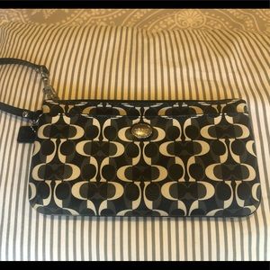 Coach wallet/clutch with strap.